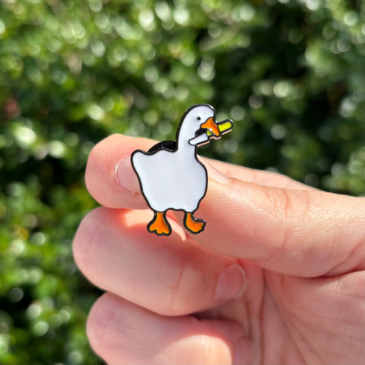 Duck with Knife Enamel Pin